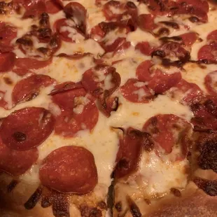 a pepperoni pizza in a box