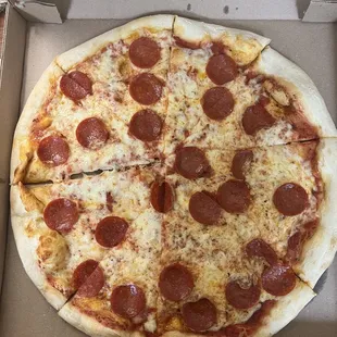 a pepperoni pizza in a box