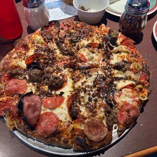 Italian meats, well done add olives, onions and shrooms.