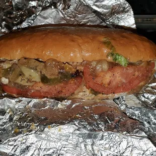 Chicken cheesesteak on a soft roll