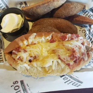 Meatball half sub with their wedge taters.