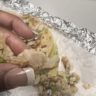 Ordered one chicken taco this morning and my meat is not fully cooked. Had to spit all my food out. This is so disgusting .