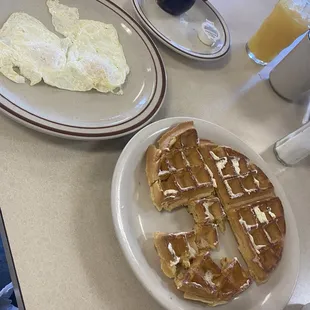 Belgian waffle and perfectly made eggs