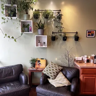 two leather chairs and a coffee table