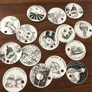 Gift tags for their free gift wrap. Artwork by Nikki and Lindsey, both employees, did the artwork!