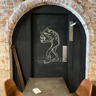 Sitting area with Loveland Frogman
