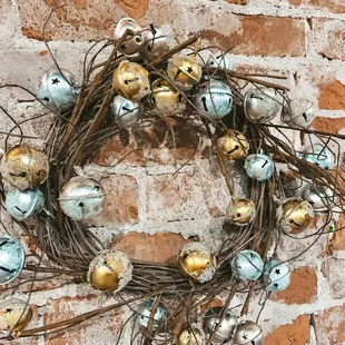 a wreath made of bells and twigs