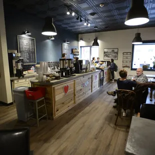The main barista area with seating shown