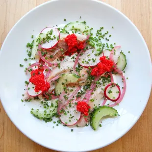 Whitefish Plate: Includes smoked whitefish, radish, cucumber, whitefish caviar, olive oil, and sour cream