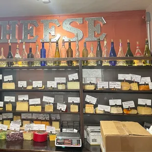 shelves of cheese and wine