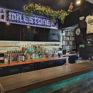 a bar with a wooden bar top