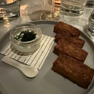 Crispy potatoes with crème fraîche and caviar
