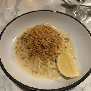 Spaghetti with lemony breadcrumbs, little neck clams, and pork belly