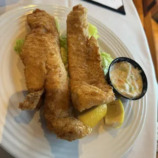 Large walleye fillets with light crispy batter.