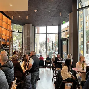 a large group of people sitting at tables