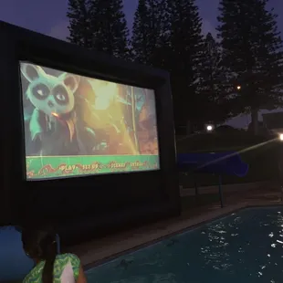 Inflatable screen by the pool