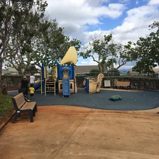 Kiddie playground just outside of swimming pool.