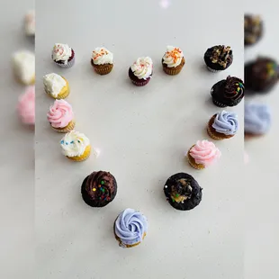 a heart made out of cupcakes