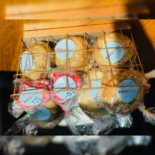 a wire basket filled with donuts