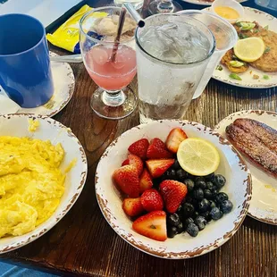 Scrambled eggs, fresh fruit, sausage, coffee, Brunch Punch, fried green tomatoes