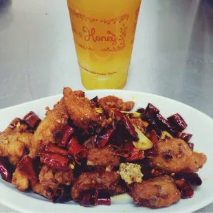 Szechwan spicy chicken and a Milk &amp; Honey passion fruit tea to cool down the spice:)