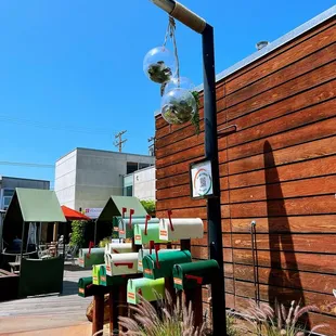 a street corner with mail boxes and a street light