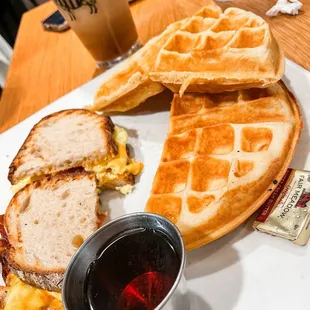 Bacon, Egg and Cheese Sandwich on SourdoughToast with Buttermilk Waffle and Caramel Macchiato