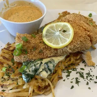 Salmon Hash (#4) with fried salmon and creamed spinach