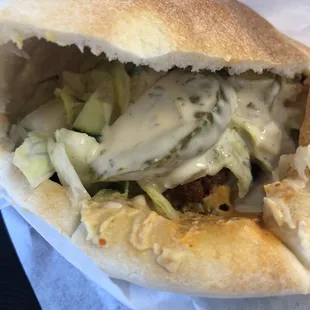 Closeup of felafel sandwich.