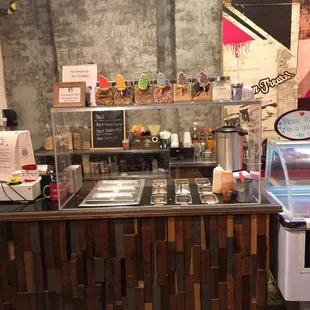 a coffee shop with a counter