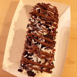 The best coconut, milk chocolate drizzle, sprinkles, oreo and coconut shavings ice cream bar I've ever had!