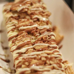 Vanilla Gelato, Milk Chocolate, White Chocolate drizzle and Cinnamon Toast Crunch.