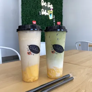 Large Jasmine Milk Tea with egg pudding and large Matcha Latte with egg pudding