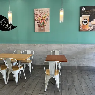 tables and chairs in a coffee shop