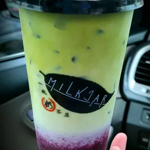 Blueberry matcha milk tea with boba
