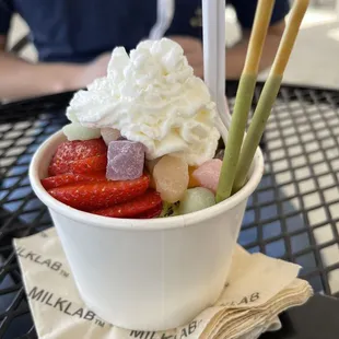 a bowl of ice cream and fruit