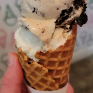 PB Cookies &amp; Cream and Happy Wife split-scoop in a brown butter brown sugar waffle cone: Close-up scoop shot!