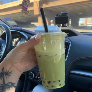 Matcha green tea with boba and oat milk