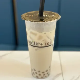 Classic Milk+Tea half sweet with boba
