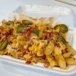 Lab Fries with Bacon, Cheese, Jalapeno, Spicy Mayo sauce and Parsley