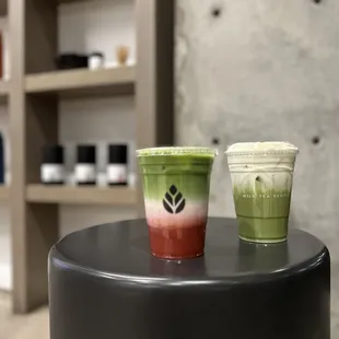 Matcha Strawberry Latte + Sweet Cream Matcha Chai Latte.