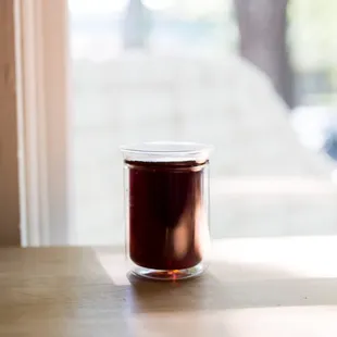 Coffee and a window seat to just hang out at and watch people in the street.