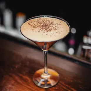 a closeup of a drink in a martini glass