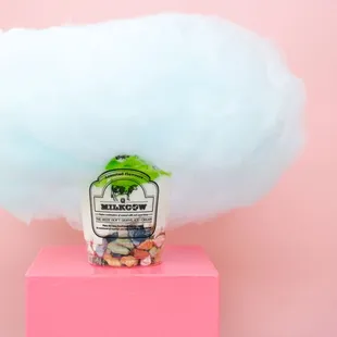 a cotton candy cloud on top of a pink box