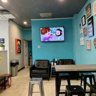 a tv in a blue room