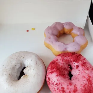 Eggnog and raspberry cake donuts with blueberry lavender mochi donut