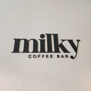 the logo on the wall