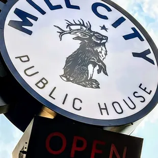 a sign for a public house