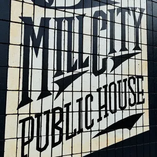 a sign for mill city public house