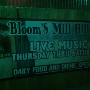 a sign for a music event